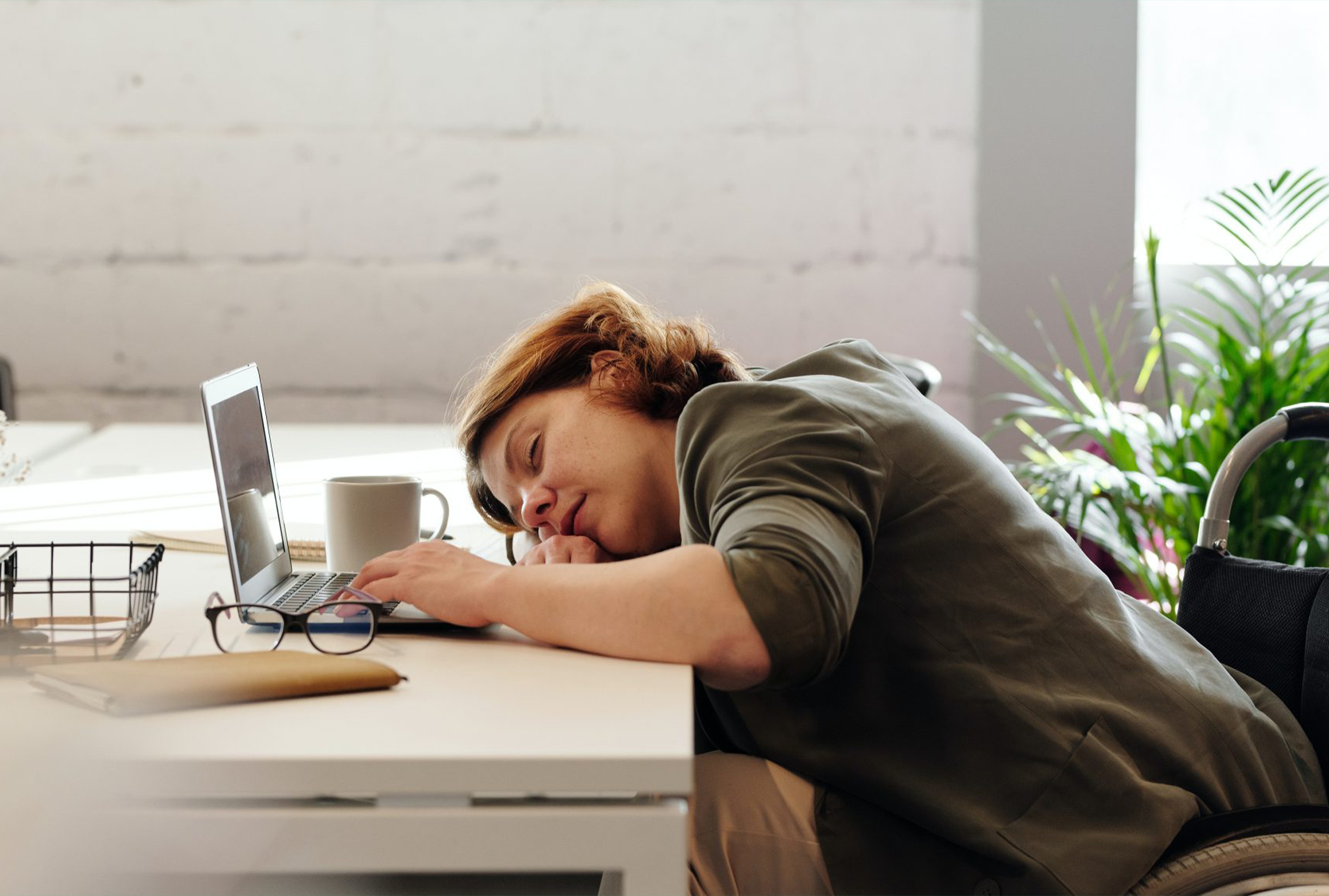 Woman working sleeping tired