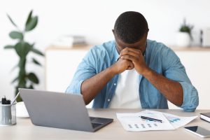 Depression work male laptop